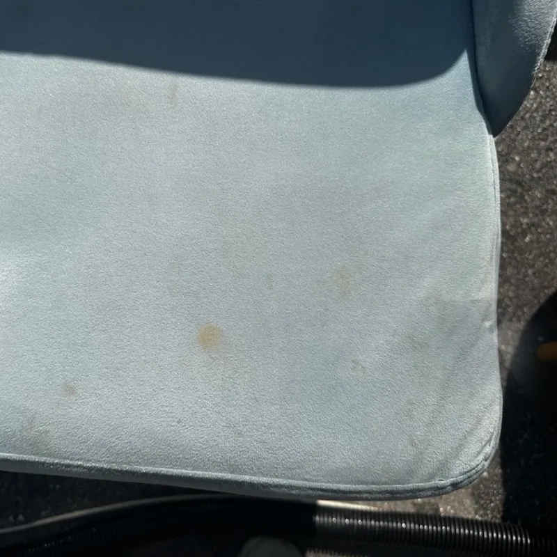 chair with visible food stains before deep cleaning