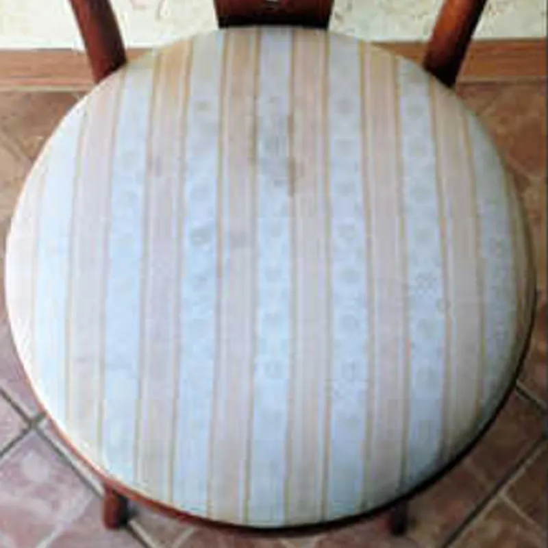 round upholstered chair seat cleaned of discoloration